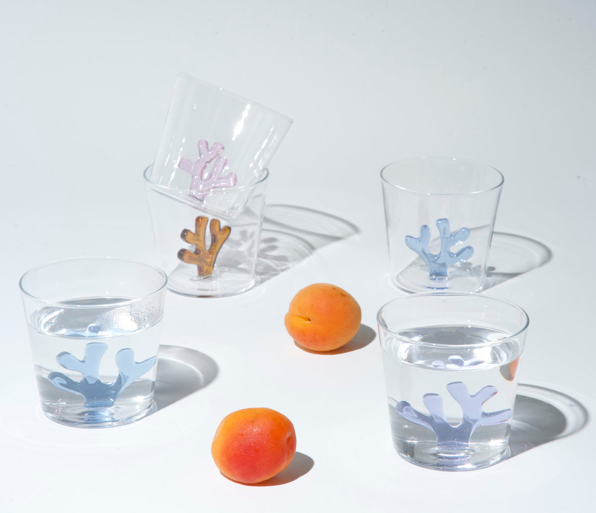 Stacked Ichendorf Milano Coral Reef Tumblers in Lilac, Blue, Amber and Blush Pink