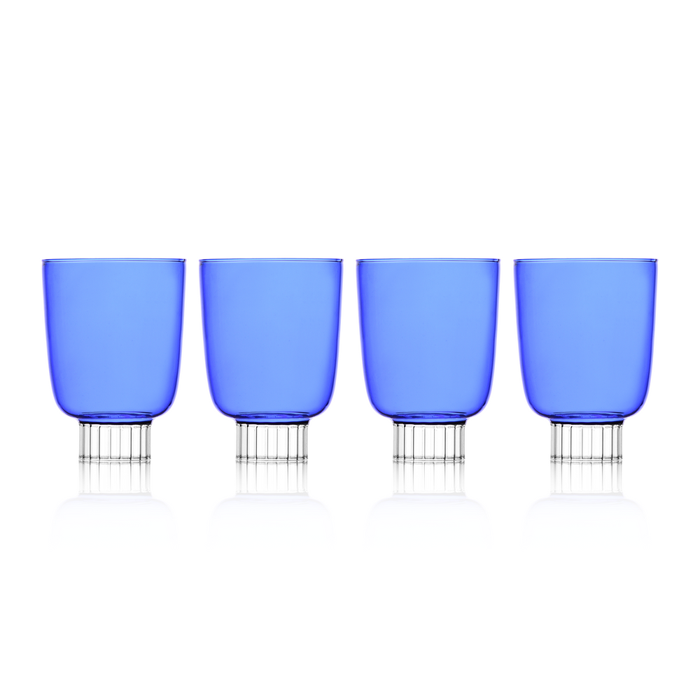 A collection of Sprezz's blue colored glass tumblers showcases the brand's prowess in creating colored glassware that's both eye-catching and practical. Ideal for serving wine, water, or any beverage of choice, these glasses add a splash of color to any occasion, from casual dinners to sophisticated celebrations.