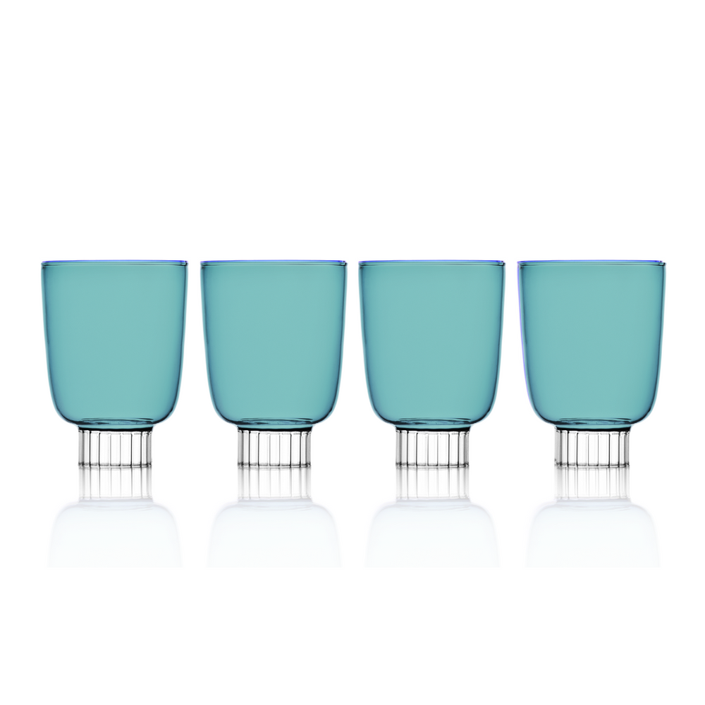 Set of four stemless wine glasses in forest teal. Colored glassware that can be used as water tumblers, wine glasses, or cocktail glasses.